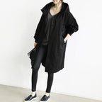 Trench-coat imperméable pour femme au design contemporain, idéal pour un usage quotidien